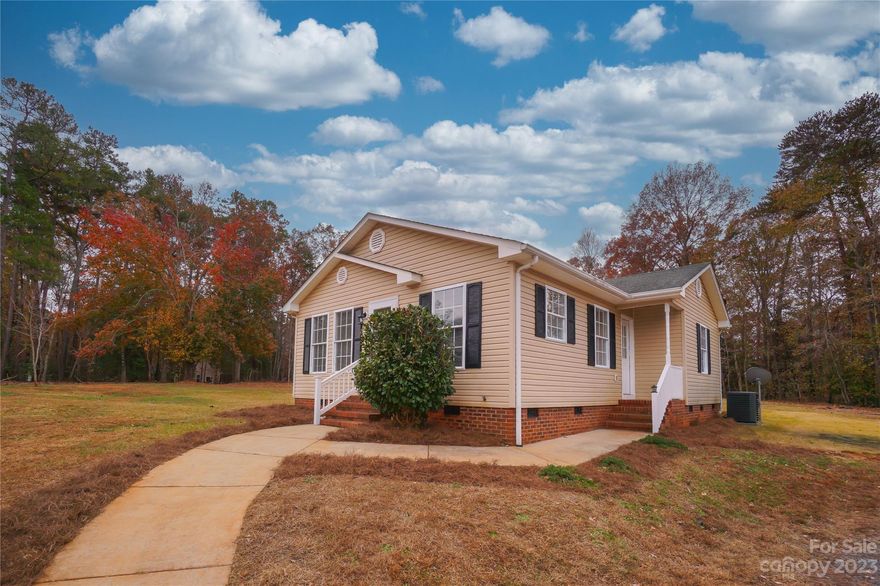 Extremely neat and ready for new owners! Enjoy comfort and low maintenance in this cozy 3 bedroom 2 bath home in the waterfront community of Lake Tillery. This newly updated home sits on a nice corner lot and is just a short golf cart ride to the lake where you will find the pool, clubhouse, boat launch, and tennis courts.