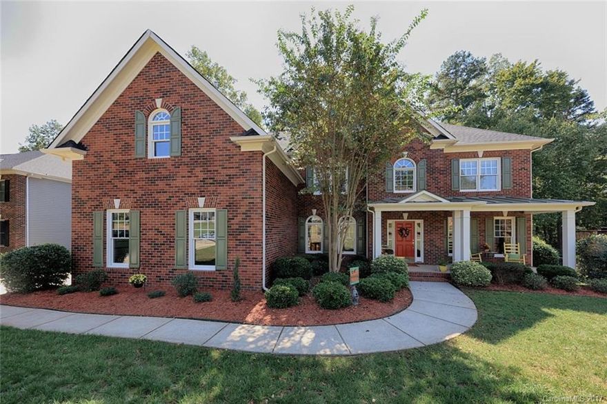 Relax on your rocking chair front porch in this beautiful 3 story home in amenity rich Silver Creek! Kitchen w/solid surface counters, island, abundance of cabinets & large breakfast area. Fantastic mudroom, large laundry, formal dining, office w/French doors, & guest bed on main w/full bath. Oversize owners suite w/ tray ceiling, 2 walk-in closets, dual sink vanity, soaking tub, & fantastic vaulted flex room. 3rd floor bonus has 2 XL storage closets. All on amazing private wooded lot w/fire pit