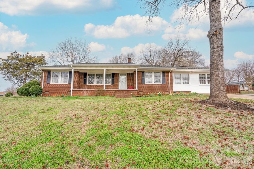 This 3-bedroom, 2-bath brick and vinyl home offers space, functionality, and peace of mind with a newer roof and vinyl replacement windows. Inside, you’ll find a comfortable living room plus a large bonus/family room, perfect for entertaining, a playroom, home office, or additional living space.  The kitchen comes equipped with an electric cooktop, wall oven, dishwasher, refrigerator, and microwave—all remaining with the home. The spacious laundry room provides room for two sets of washers and dryers, offering incredible flexibility and convenience.  Situated on a generous .416-acre lot, the property features abundant concrete parking and a storage building for extra storage or workshop needs. With plenty of indoor and outdoor space, this home is ready for its next owner!