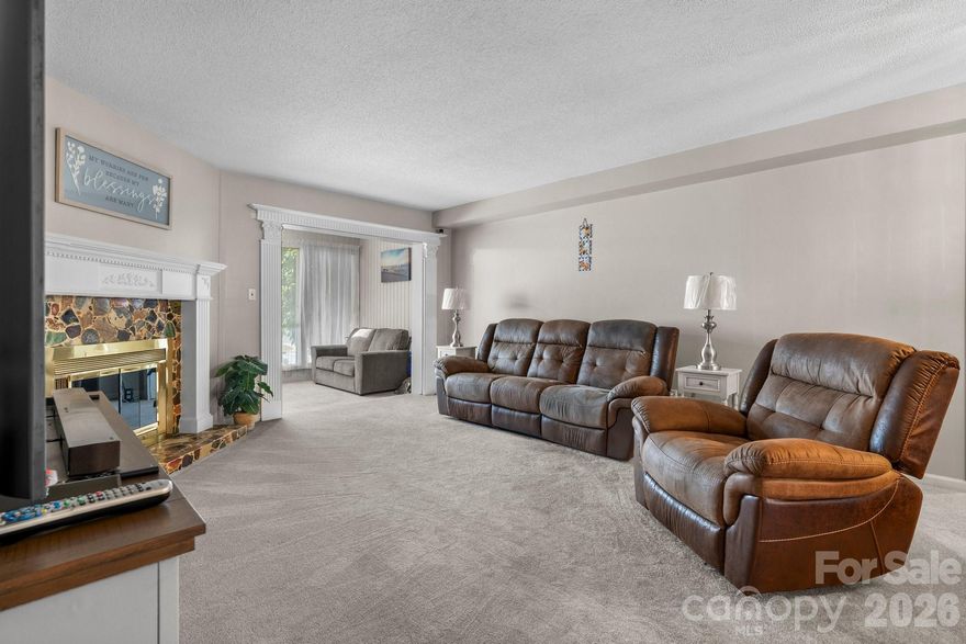 MOVE-IN READY! OVER 1800 SQUARE FEET! Large townhouse in TARA WOODS right beside the POOL! Primary bedroom and laundry on the main level, a fireplace in the living room and a gorgeous sunroom with skylights. A beautiful kitchen with polished cabinetry and all appliances will convey at closing! Upstairs you will find 2 spacious bedrooms and a full bathroom. Did I mention the nice hardwood flooring and plush carpet? Freshly paint, updated light fixtures & ceiling fans! Located minutes to Lenoir Rhyne University! Also minutes from shopping and dining. Seller is very motivated!