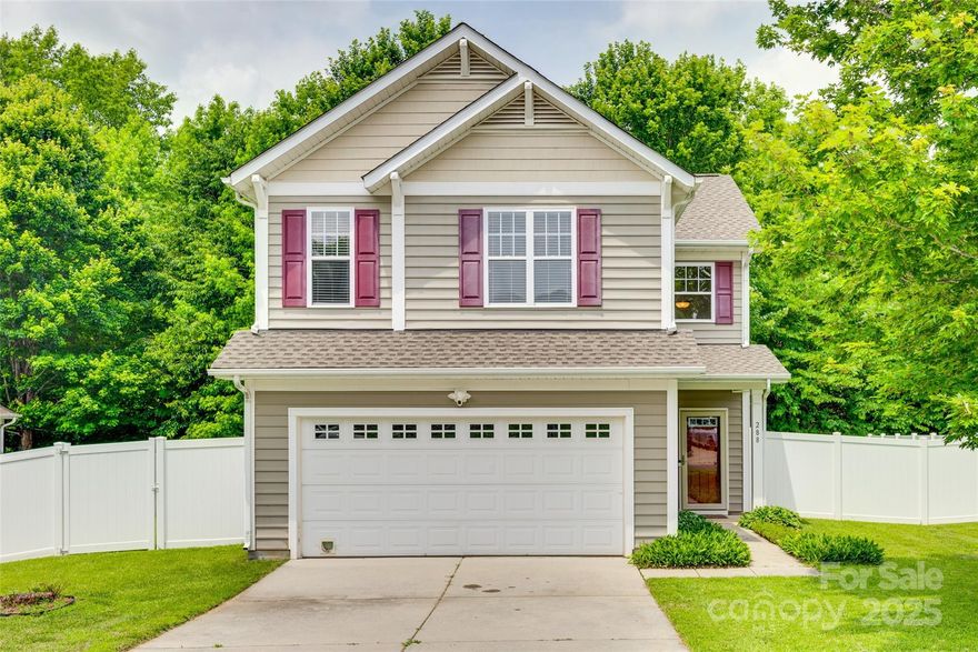 Welcome to this lovely home nestled within the sought after Whitley Mills neighborhood. NEW ROOF and FENCE in 2024. This home offers a cozy layout with gas log fireplace making it conducive to relaxation. It also showcases an eat in kitchen complete with breakfast bar that lends itself to buffet style entertaining, while also providing direct access from the 2 car garage for your grocery run convenience. Later in the evening, enjoy your time with your favorite spirits or morning bolst of caffeine when you step out back onto a paver-stone patio where the partially fenced yard backs to a natural wooded area offering a sense of privacy and tranquility. Make it your own, Let's see what you can do!