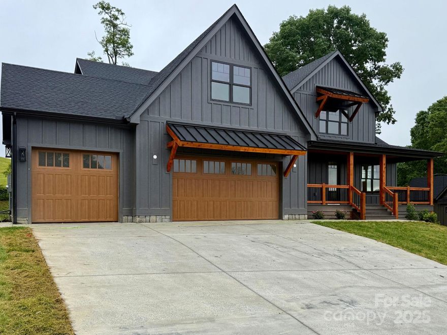 The Reserves at Roper Farm is a gated community that offers unrivaled Mills River views, luxury finishes, large lots, community pavilion, fire pit, playground, dog park, & walking trails. Each home boasts rich wood flooring, min 10' ceilings & 8’ doors throughout the main floor, gourmet kitchens w/ beautiful countertops, ZLine appliances, 48” gas range, pot filler, beverage fridge, & 42” cabinets. Open concepts draw you to the living room w/ stone gas fireplaces. Primary suites offer an en suite bathroom, soaking tub, spa-like tile shower, & walk-in closet w/ wood shelving system. Many plans include bonus rooms & office space for versatile use as well as 2 & 3 car garages. Enjoy peaceful WNC outdoors on screened composite decks w/ rock fireplaces & outdoor living options. Whole home generators, Anderson windows & tankless recirculating water heaters are a small part of high quality construction & finishes raising the bar for these magnificent homes. Come pick your lot & plan today!