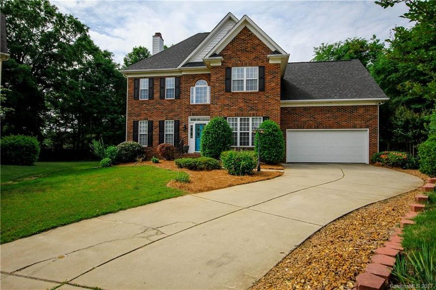 Fantastic decorator owned home with beautiful upgrades and unique spaces. Open Foyer flanked by a library/office and dining room. Open kitchen w/sparkling new granite countertops and gas stove.  Spacious Master suite with a tray ceiling, deluxe Bath w/double vanities, garden tub, large walk in closet. The kids room with built in beds and a loft is amazing.  The enormous backyard has an oversized newly painted deck and plenty place to run and play with privacy and large hardwoods. Move in ready!