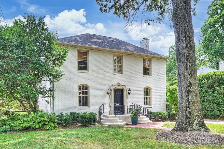 Elegance meets charm in this traditional painted brick Myers Park home! Situated on a unique, deep .33 acre lot, 1723 Beverly is move-in ready and features a detached 2-car garage, newer roof (2020), and recent HVAC updates (2022). The grand foyer with black & white marble flooring leads to a formal living room with hardwoods, wood-burning fireplace & beautiful built-ins. Handsome wood-paneled study plus formal dining room with beautiful moldings. The updated kitchen features custom white cabinetry, stone counters, and high-end stainless appliances plus built-in breakfast niche. The light-filled family room boasts exposed brick, high ceilings, and arched glass & steel windows. The serene primary suite features a large sitting room, updated en-suite bath & dual closets. Three spacious secondary bedrooms (one w/ en-suite bath). Outside, the brick and blue stone patios overlook the pristine yard. This home offers classic sophistication in a premier Myers Park location- don't miss!