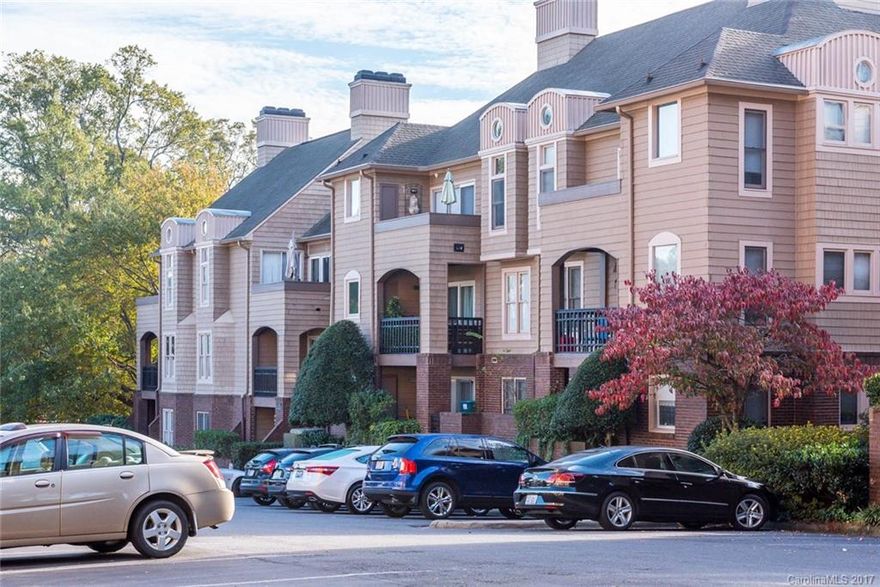 Desirable location on E Morehead St in Dilworth. Centrally located to restaurants, shops, Bank of America Stadium, and all that Charlotte Uptown living has to offer! Top Corner Home overlooks the pool area and has a great view of the Uptown Charlotte Skyline from the balcony.  Wood flooring throughout most of the home. New flooring just installed in the laundry room. Open Den with fireplace.