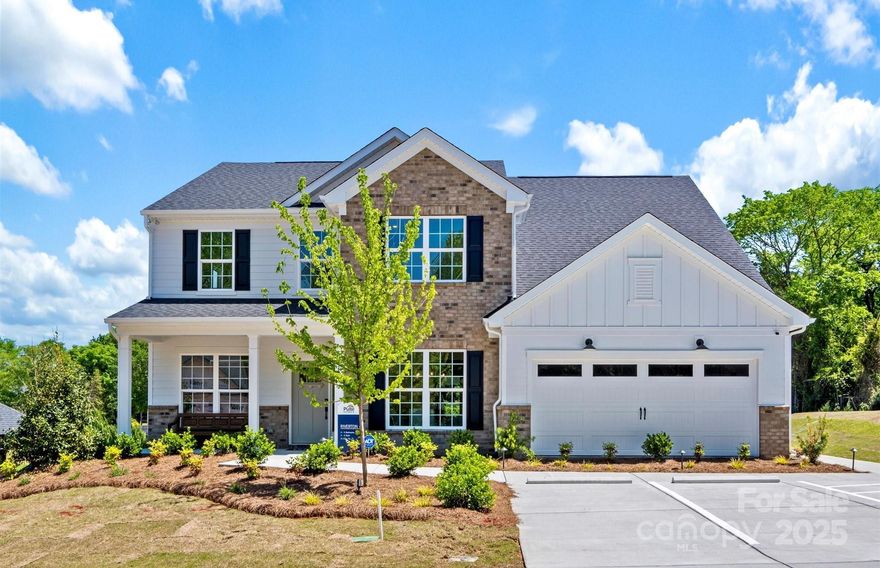 The beautiful Riverton model home is now for sale in Patterson Pond. This two-story, single-family residence offers 5 bedrooms, 4.5 bathrooms, with a guest suite on the main level. It encompasses over 3,500 square feet. Designed with an open-concept layout, the home features a spacious kitchen that flows seamlessly into the gathering area, making it ideal for entertaining. Additional highlights include a sunroom off of the gourmet kitchen, formal dining room, an office. Upstairs, a loft provides extra living space, while the owner's suite boasts 2 large walk-in closets and an en-suite bathroom that will be the envy of the neighborhood. Situated within an intimate community of only 19 lots, residents benefit from proximity to highly rated Fort Mill schools, major employment centers, and recreational amenities.