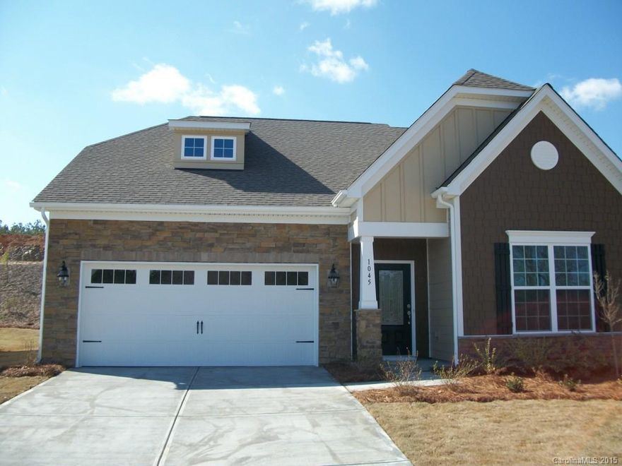 Four bedroom 2 1/2 bath home featuring a master bedroom downstairs with tray ceiling, study, open kitchen, and three bedrooms and loft upstairs.