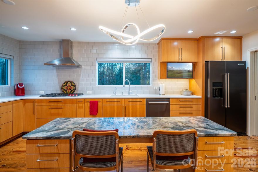 Private 1/2-acre oasis in the heart of south Charlotte at end of quiet street off Providence Road at Fairview.  Renovate, new construction build, or move in to the well maintained, white painted brick ranch 4 bedroom/3 full bath with formal and casual living rooms, spacious sunroom, large renovated kitchen and 2 car garage with modern full kitchen/bathroom apartment above (see pictures).  All on one level living except detached full kitchen apartment is above garage with private entrance and can be used as a studio, mancave, guest house, short term daily rental, or long term rental income as there is no HOA or rental restrictions above city code.  Full laundry hook ups off primary bedroom and in garage for apartment.  
Park in the oversized 2 car garage or dedicated spots near front door.  As you enter the foyer a formal living room is to the right and informal family room straight ahead.  All 4 main home bedrooms have closets though 2 are currently used as offices.  The 3 seasons sunroom connected to the informal den sits right beside the inground chlorine pool with large hardscaped deck surround.  The mature shade trees and professional landscape cover the entire lot with decades of carefully chosen Japanese maples and various specialty plants added over the years.  No traffic to be heard or seen on this dead end with tremendous upside whichever route you determine to be highest and best use of property.   Solar power system (2 Tesla storage batteries and 27 panels for full house power during an outage. 
A beautiful home with endless possibilities sure to be a great investment.  Location, location, homecation!