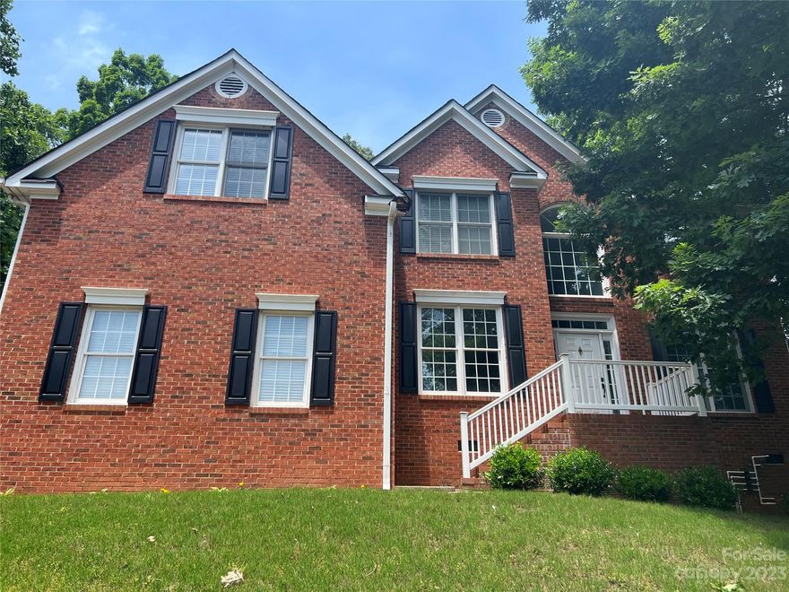 Large, updated, executive home in highly sought after Regent Park! Resort-like amenities include an outdoor pool, tennis courts & walking trails. This home features a stunning 2-story foyer, formal study and living room on the main level, butler’s pantry just off the formal dining room for easy entertaining, a large private family room with gas fireplace, updated kitchen, and half bath to finish off the first floor. On the second level, you'll find TWO PRIMARY SUITES, spacious secondary bedrooms and a 5th bedroom/bonus room. Relax on the private, oversized back deck for outdoor entertaining. The 2-car oversized side-load garage features a work area with built-in workbench and storage.  Lower York County taxes, Highly rated Fort Mill Schools and conveniently located 5 minutes from I-77 and 15 minutes to uptown Charlotte! See attached updates feature sheet for more!