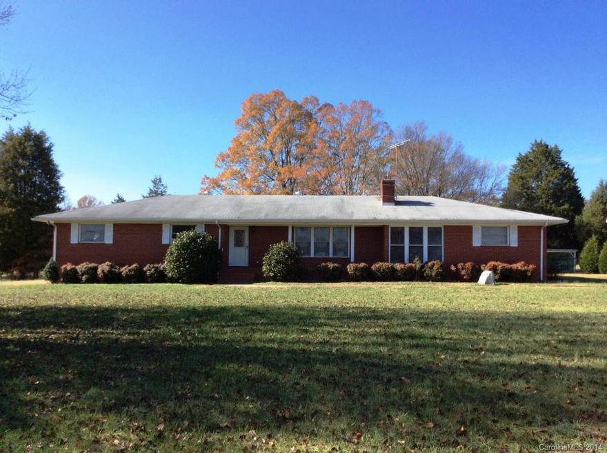 Say you want some land to do as you please? Here it is!!! 12+ gorgeous acres with a pond (bring your rod), barn, several outbldgs...perfect for horses or cows. Great brick Ranch built by original owner. Lg Laundry Rm. Great Room features masonry FP w/gas stove. Breakfast area off Kitchen. Separate Dining Room. Master Bedroom has a full bath attached. Some cosmetic updating will make this your new dream home. Hardwood floors under carpet in Bedrooms. RV hook-up. Fencing for pasture in place.