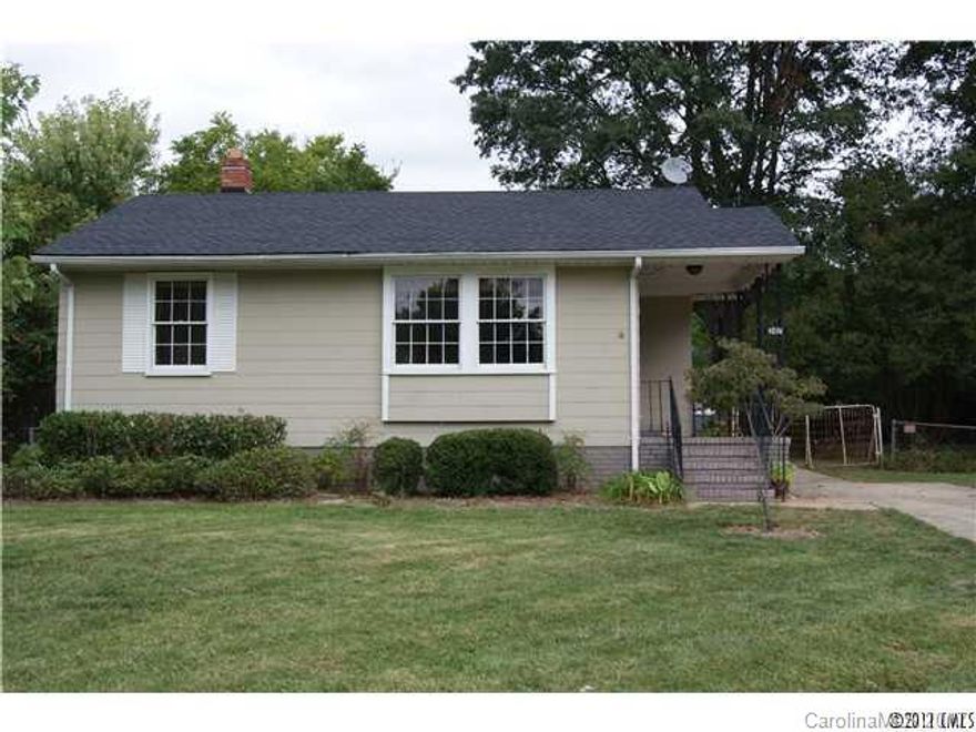 Charming home in Sedgefield surrounded by a beautiful yard.Hardwood floors, ceramic tiles in kitchen & bath. No Carpets! Enjoy outdoor entertainment in a beautiful fenced back yard w/matured landscaping & warp around deck.  Close to uptown, Freedom Park, light-rail, shops & restaurants! This home is truly a gem! outside storage & secuirty system as is.