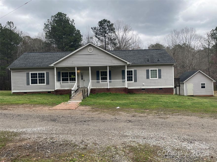 3 Bedroom 2 Bath Homes on Generous 1.41 Acre Plat. Home Features Open Kitchen area with access to both Dining Room and Great Room w Fireplace. Separate Laundry area. Covered Front Porch and Screened Covered Rear Porch. Home in need of updates and repairs.