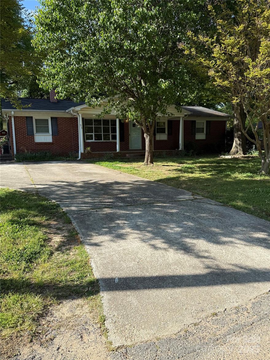 Charming all brick 3 bedroom /1.5 bathroom home in Gastonia, NC. Situated on a spacious .42-acre lot with 1,374 heated & cooled square footage, along with an additional 273 square feet of an enclosed 3-season room - perfect for relaxing & / or entertaining! Enjoy cooking & baking in the kitchen & charming dining area, the generous living spaces (nice size living room & a spacious den with a wood burning stove), all full of natural light. 

The oversized yard offers room to garden, play, or add outdoor living features. Tucked in a convenient location with easy access to shopping, dining, and major routes. 

This home qualifies for 18 Down Payment Assistance Programs - a fantastic opportunity for first-time or move-up buyers! Don’t miss this blend of value, space, and potential! ???

?? Don't miss this rare opportunity to own an affordable home with space, charm, and major buyer incentives!
