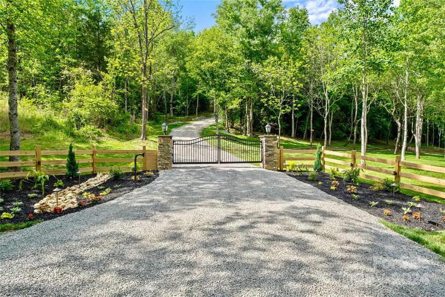 Welcome home to Rocky Creek Ranch, a stunning 60-acre property that is an oasis, ready for your dream home or a compound of homes; just minutes from I-77! This private and serene, well-manicured, gated estate features a brand new custom-built horse barn, a well-maintained pasture, over 2 miles of scenic trails winding through lush forests and over creeks, etc. Enjoy several developed picnic and beach areas along Rocky Creek, perfect for camping and relaxation! The property is equipped with a septic permit and underground electrical system, making it easy to start building your forever home! The beautifully landscaped entrance with gated access adds privacy and charm. Experience the tranquility of rural living with the convenience of being close to the city. Don’t miss this rare opportunity to create your bespoke haven. Nothing left to do but add your home! Copy and paste to view video: https://vimeo.com/949932902?share=copy