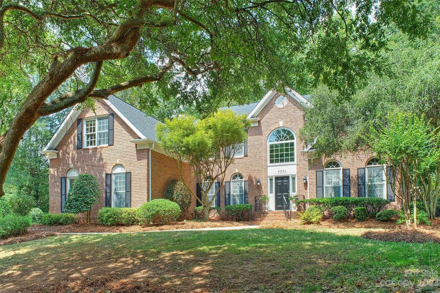 Incredible opportunity in The Preserve at Belingrath!  Stunning, full brick home in cul-de-sac with wood floors throughout, primary bedroom on main level, sweeping two-story foyer and family room with fireplace, and fabulous open floor plan! The renovated kitchen designed by Jeanine Devaney/Charlotte In-Vironments, features an oversized island with breakfast bar, induction cooktop, gourmet refrigerator, granite counters and bar area for entertaining! The spacious dining nook with built-in bench overlooks the scenic rear yard! Secluded yet deluxe primary suite with renovated spa bath is a great place to relax! Side entry with covered porch leads to drop zone with built-in storage and large laundry room.  Dual staircases, formal living room and dining room, and plantation shutters add to the appeal of this fine home.  En suite baths in three of the four upper level bedroomsl, loft and bedroom/bonus room.  Covered rear porch, fenced yard, beautifully landscaped in the heart of SouthPark!