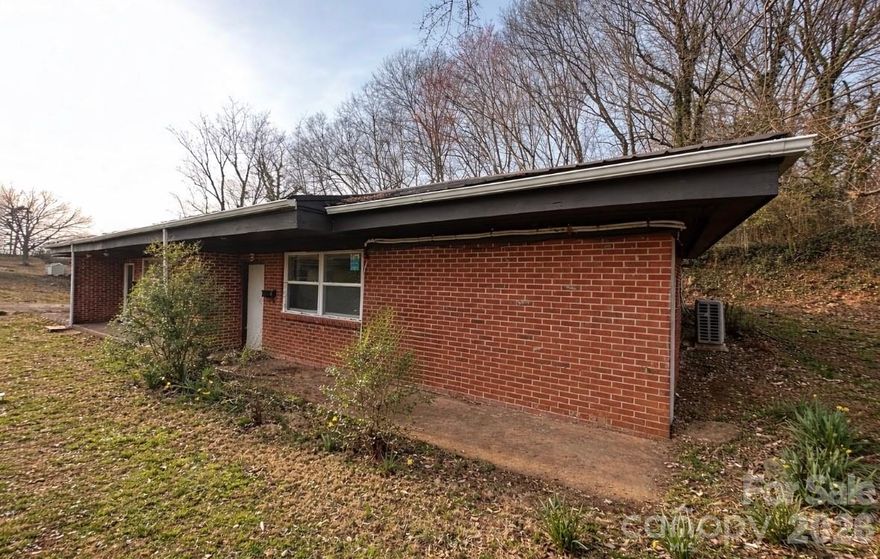 Turnkey Triplex Near Downtown Hickory - Prime Investment Opportunity. Don't miss this fully updated triplex conveniently located just minutes from Historic Downtown Hickory- prime location just minutes to restaurants, shopping, hospital and Lenoir-Rhyne University! Each of the three units features 2 bedrooms and 1 full bath, offering comfortable layouts that appeal to a wide range of tenants. The property has been thoughtfully updated throughout providing modern finishes and low-maintenance living. Recent improvement include brand new gutters, mini-split HVAC units installed in 2024 and new windows, ensuring energy efficiency. With a strong rental history, this is an excellent opportunity for investors looking for steady income. Rent all three units for maximum cash flow, or live in one unit while renting the other two to offset your mortgage. Whether you're expanding your portfolio or looking for you first multi-family investment, this property offers location, updates and income potential all in one package. Schedule your showing today!