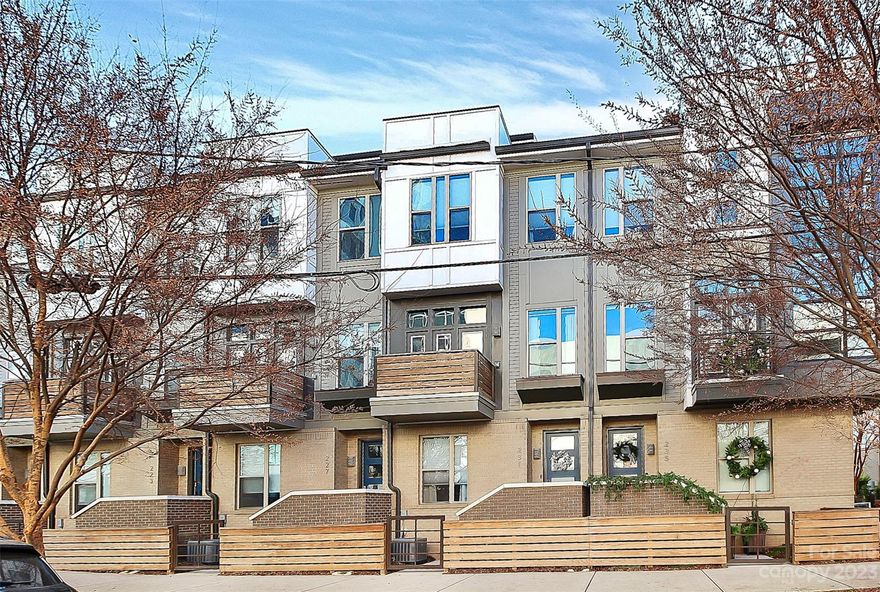 Experience Southend living at its finest in a rare Helix Townhome. This home is conveniently near Atherton Mill shopping and dining plus the East/West light rail station merely a block away. This modern townhome with rooftop patio,  top-of-the-line smart appliances, and an oversized one-car garage designed to accommodate all your toys & hobbies. The home features hardwood flooring, sleek quartz countertops,  Tesla Charging Station, Nest learning thermostats, Yale assure locks, and GE Cafe Smart Induction and Convection Range + Microwave in a stunning Platinum Glass finish.