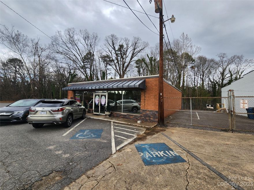 Great retail space on the burgeoning Old Lenoir rd.  This masonry freestanding building features plenty of parking and driveby traffic on this vital artery between Hwy 321 and downtown Hickory.  The space has recently been used for clothing retail and is set up with one office, some fitting rooms, and one large open space but could easily be configured in a multitude of ways for office, retail, convenience, or other uses. This property will be directly located on the future OLLE ART WALK which connects various areas of Hickory thru walking and cycling paths.  More information can be found here.https://www.hickorync.gov/olle-art-walk-information