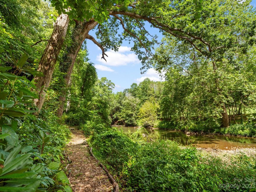 Enjoy life by the beautiful Swannanoa River! 2 lots available for a combined 1.16 acres with water frontage coupled with mesmerizing views of the river. This is a truly unique opportunity to own level land at the end of Driftwood Court with no thru traffic! Create your own paradise here! Amazing location less than 20 minutes to downtown Asheville, convenient to interstate, and close to Asheville's vast array of amenities! 2 PINs.