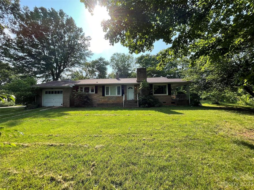 Come see this 3 Bedroom 2 Bath brick home with a basement. This home features updated ceilings throughout the home. The updated kitchen consists of new flooring, butcher block counters, painted cabinets, new light, and new appliances. There is original hardwood flooring throughout the house and new flooring in the updated bathroom. The master bedroom and bathroom still have a ton of potential and is looking for a new makeover.  This home also features a one-car garage, two carports, and a sunroom that you can enjoy sitting in and looking out the windows. This home sits on 2.38 acres.