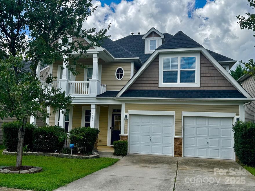 NEW PRICE AND NEW ROOF installed 8/25!!  This Charleston style beauty offers everything you could want in a home! Open floor plan, location and space. Lovely foyer welcomes you to the main level featuring wood flooring throughout. Living room, spacious kitchen w/granite countertops, SS appliances and pantry are open to dining room. Family room with gas FP overlooks the extended patio and private fenced yard. Bedroom/office (carpeting) and bath completes the main level. Upstairs you will find the spacious primary suite with private access to upper covered porch, 2 WIC's and luxury bath. There are 3 additional good sized BR's and laundry room on upper level.  2 car garage.  Neighborhood amenities include pool, recreation areas, dog park and playground.  Quick closing available! SELLER MOTIVATED!