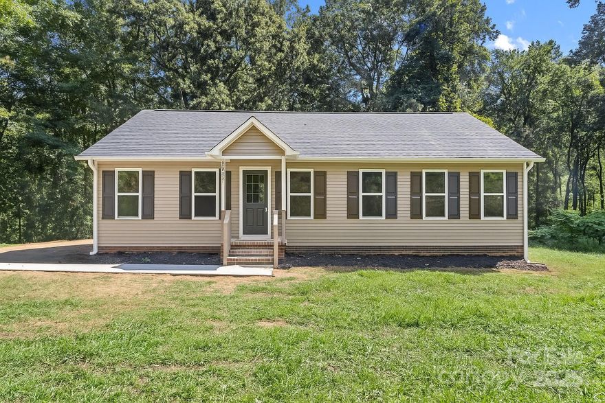 CUTE ranch freshly upgraded ready for you on a 1.0 Acre Lot! This 3 bed, 2 bath home sits on a beautiful lot with lots of mature trees to give you a little privacy! Walk into the home onto NEW Designer LVP flooring throughout! Main living spaces are nice and OPEN! Kitchen is stunning w/white shaker cabinets, granite countertops, bar seating, and NEW SS Microwave, Dishwasher, and Electric Range. Dining area great for 6 person table! Laundry is out of the way at the end of the kitchen. SPLIT floorplan! The Primary Suite it spacious and features a ceiling fan. Primary bath is an oasis w/dual granite vanity, tub/shower combo, and AWESOME walk-in closet. Both guest beds are ample in size and share the additional full bathroom w/single granite vanity and tub/shower combo. Come see it today!