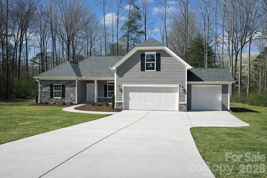 Beautiful semi-custom 4-bedroom, 3.5-bath home with a 3-car garage on a half-acre wooded homesite in Huntersville, North Carolina. The Shelby model offers a highly sought-after 4 Bedroom, 3 1/2-bath split-bedroom ranch design. Its versatile layout provides comfort and practicality to suit many different lifestyles. It also includes a private upper-level suite complete with a full bathroom. Prospective buyers can view the Shelby floor plan in person at a recently completed home, just minutes away in Corries Meadow. This home is located at 456 Allen Dr, Concord, NC 28027 (MLS#4333788).