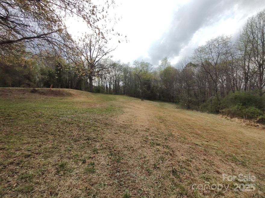 Discover the beauty and potential of this private 2.78-acre lot, featuring three designated build sites, two of which already have septic systems in place. With city water available, this property is primed for your dream home or investment opportunity. Enjoy the tranquility of private country living while still being close to local amenities. This lot offers the flexibility and privacy you desire. Don't miss out on this exceptional opportunity!