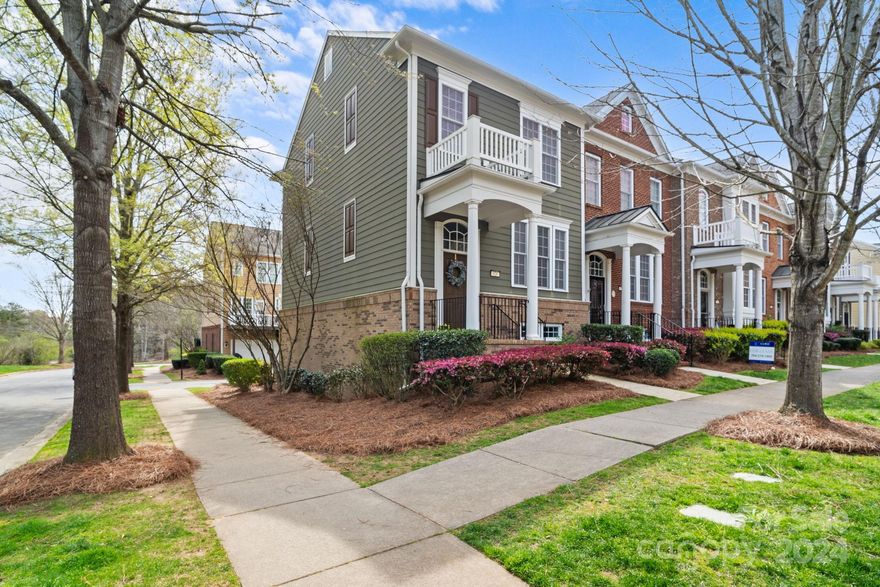 Enjoy easy, maintenance-free living in this spacious, end-unit townhome. Award-winning Fort Mill school district and perfectly located near an entrance to one of the community's multiple walking trails. Two primary suites on the upper level, each with new carpeting, large walk-in closet and full bathroom. Beautiful, new LVP flooring on main  and lower level. Tons of natural light in the kitchen and dining area with freshly painted cabinets, stainless steel appliances, gas stove, center island, and granite countertops. Large living room with gas fireplace for enjoying quiet nights at home. The lower level room and full bath is perfect for an additional bedroom or home office. Abundant storage closets throughout the house and 2 car garage. Baxter Village amenities are second to none with multiple outdoor pools, tennis courts, parks/playgrounds, walking trails and activities director for planned community events. Experience all that makes Baxter Village such a special place to call home!