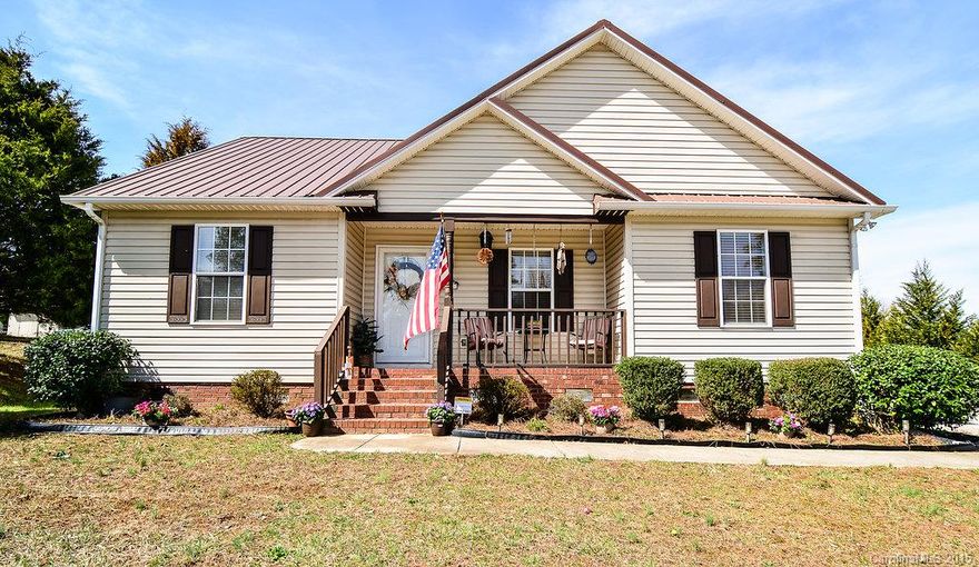 Adorable, very well maintained 3 bedroom 2 bath home with an open floor plan, vaulted ceilings, arched doorways and an added all wood additional family room! Tons of walk in closets and an attached carport along with a new tin roof. Must see!