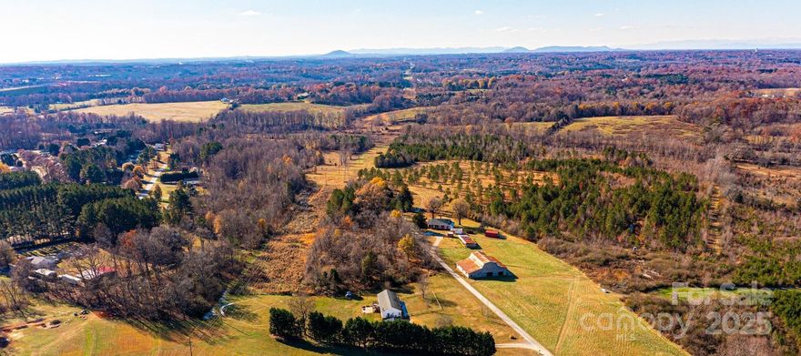 Be in complete seclusion and still only a five-minute drive to I-40 Exit 132 and a super Walmart Center with restaurants. This is about as flat as it gets in the Catawba Valley and not split by streams. This is a good place for a homesite or multiple large tract homesites outside the city limits with plenty of wildlife. Zoned R-20 county zoning with City of Conover water availability in two directions. Septic is needed. Access to this site is on a platted r/w from NC Hwy 16. Clean Phase I and survey are available.