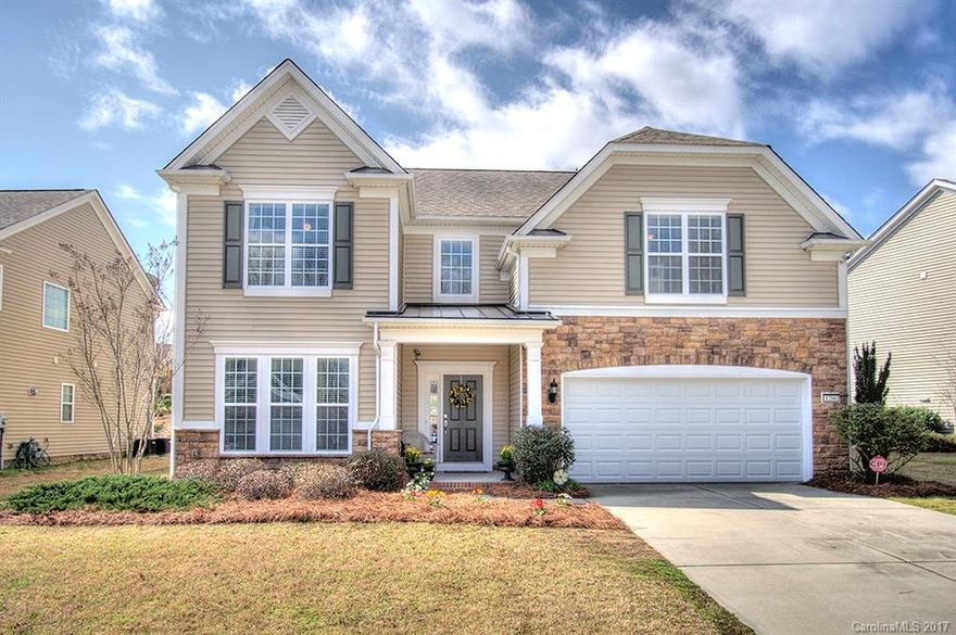 Gorgeous home in popular community!  5 full bedrooms or 4 bedrooms w/ a bonus. Stunning kitchen w/ granite, cherry cabinets, large island, SS appliances, & planning desk. Hardwood floors on main. Features: open Great Room, gas fireplace,Formal dining, study w/ double french doors, and two story foyer. Luxury Owner's suite w/ decorative tray ceiling, large WIC, dual sinks & separate tub & shower. Enjoy the community pool,water slides and splash pool. Ideal location between I-77, I-85 and I-485!