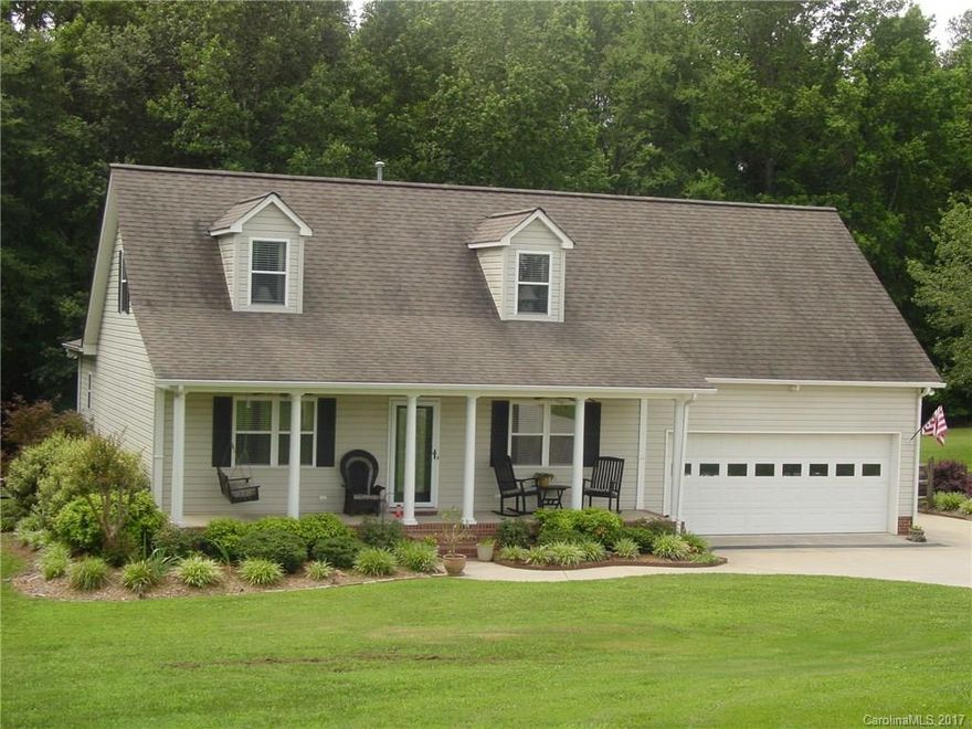 Country living at it's best. Beautiful well maintained home with all neutral colors. Granite, tile bath, hardwood flooring, sun room that can be extra sitting, den, or dining room. Beautiful well maintained yard. Ample storage with built ins and walk in closets. Dual Units, rocking chair front porch, extra storage in attic, 220 electric system for generator, electric fencing. Gorgeous wooded view, natural lighting throughout. Open den, dining, and kitchen area. MOVE IN CONDITION.