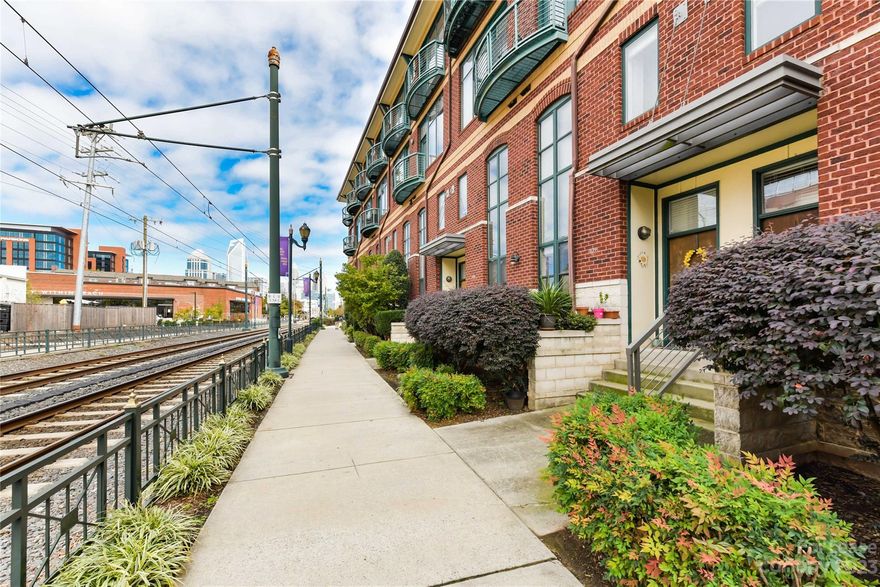 Live your best life in the heart of Southend in this fabulous 2 story loft! Easy living awaits in this well designed one bedroom floor plan with flex space. Eat-in kitchen has customized luxury cabinets and granite counter tops.  Upstairs you'll be impressed with renovated bathroom and in unit laundry. Large bedroom has walk in closet and flex space is perfect for home office. Location is convenient to shopping, bars & restaurants, entertainment and more! If you can’t walk or bike you can jump on the Lynx line. Secured FOB access to the building and one assigned parking space in covered deck. Building amenities include scenic rooftop terrace which is perfect for entertaining friends or a relaxing evening to enjoy the stunning skyline view. This is property offers a multitude of convenience for the value!