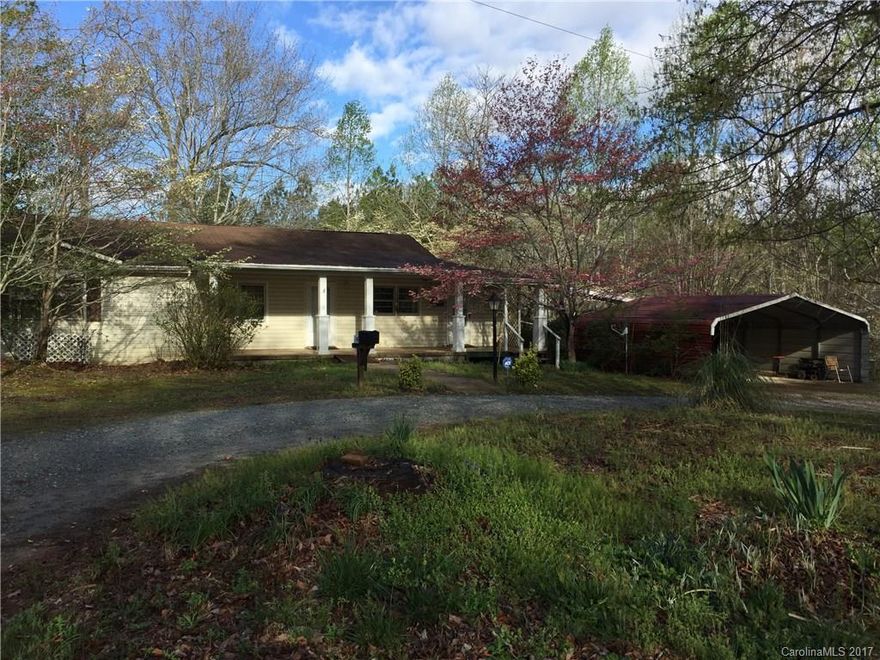 3BD/2BA Ranch on 1.08 acres! Covered front porch to welcome you inside to the family room with hardwood floors open to the dining area with access to the 12x20 deck! Spacious kitchen with ample cabinets! Separate laundry room with shelves for storage and access to the front porch! Master bedroom with master bath with double vanities, jetted tub/shower, and linen closet! All 3 bedrooms have hardwood floors! Circular gravel drive with room to park an RV on the left side of the house! A must see!