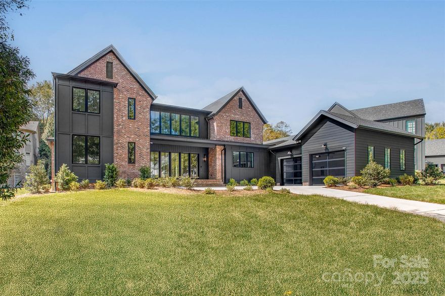 Stunning new construction featuring a modern design and a European-style kitchen with state-of-the-art appliances. Enjoy a screened porch with a large pass-through window from the kitchen, and a spacious living room with a gas fireplace that opens to a bluestone patio through oversized sliding glass doors. Located in the highly desirable, tree-lined High Grove neighborhood, offering privacy and an established community feel.

This home is conveniently close to top-rated elementary, middle, and high schools. The property includes a generous yard with potential space for a pool. Each bedroom features its own private bathroom. Professionally designed and decorated by L. Fontana. Additional features include a video security system, an oversized two-car attached garage with glass doors and an epoxy floor, a separate bonus room, laundry room, mudroom, scullery, and a dedicated library/office.