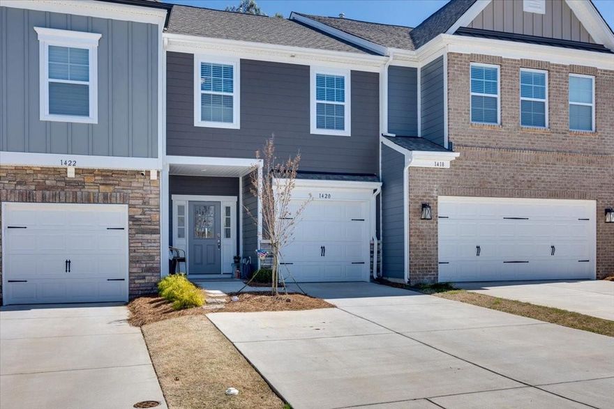 Here's your opportunity to live in Paddlers Cove! Amenities include pools, playground, kayak/canoe launch and located in the award-winning Clover School system! Open floor plan, upgraded kitchen, and off the living area is an extended patio with fence. Upstairs you will find 3 spacious bedrooms, the primary bedroom has a nice sized walk-in closet, and both bathrooms have linen closets. This is a must see!