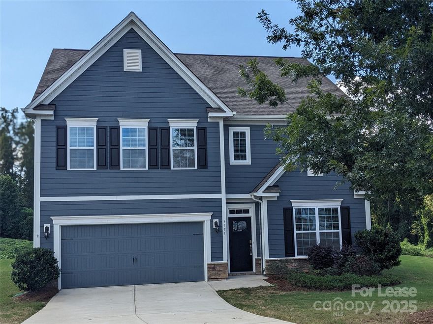 Five Bedrooms, Four Full Baths, Plus a Bonus Room. Main floor offers: eat-in kitchen with center island, granite countertops and stainless appliances. Opens to great room with fireplace, guest bedroom on main floor with full bath. Upper level offers Primary Bedroom Suite including garden tub, glass enclosed shower, dual sinks and huge walk in closet. Three additional bedrooms, 2 full baths, laundry room and bonus room complete the upstairs. Cul-de-sac lot, private backyard backs up to common green area. Beautiful back patio with brick paver patio extension including built-in firepit surrounded by wall seat. Community includes pool, playground, and pickleball courts. Near Publix shopping center, Convenient to Mooresville and 5 miles to Hwy 16 which offers easy access to Charlotte Int'l Airport and Uptown. Pets: No more than two, no more than 40lbs full growth, no puppies under one year old. $300 non-refundable pet fee. No Cats