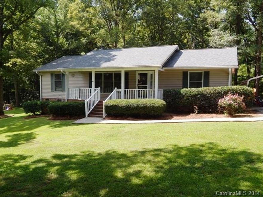Nice Ranch with open floorplan. Split BR plan, breakfast area, large kitchen/dining area. Gorgeous yard with over an acre of land, nice deck, storage building, NO city taxes!!!
