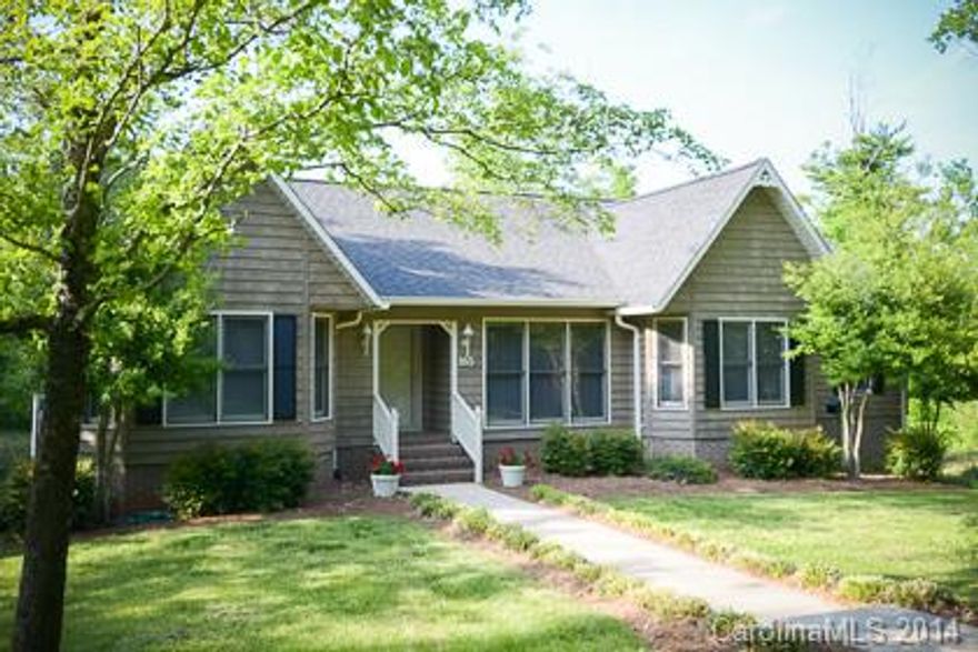 One of a kind custom home with 10.75 acres. A real treasure! Privacy, Geothermal HVAC well maintained, solar panels,  Main level has 3 bedrooms-large master , den with gas logs, eat in kitchen, basement has second kitchen with 2 bedrooms. Walk out to private patio and carport. Deck, outbuilding garage with shop. Fruit trees, lots of privacy. Septic layout has been ordered from county. Septic is for a 3 bedroom but the home has 5 bedrooms. 2nd living quarters a real plus.