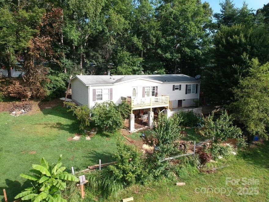 GREAT LOCATION AND. GREAT PRICE!!!. SPACIOUS DOUBLE WIDE LOCATED BETWEEN HENDERSONVILLE , FLETCHER, MILLS RIVER.  THIS 3 BEDROOM, 2 BATHROOM  HOUSE OFFERS ROOM FOR ALL YOUR NEEDS. ENJOY YOUR AFTERNOONS WITH A CUP OF COFFEE ON THE NEW  FRONT PORCH AND CONTEMPLATE THE WONDERFUL GARDEN SURROUNDED BY METICULOUS STONE WORK ON THE PATH. ALSO THIS PROPERTY COME WITH  A CONCRETE RETAINING WALL IN THE BACK; AND ALSO AN ENCLOSED PORCH TO ENJOY THE SUNSETS
DO NOT MISS THIS GREAT OPPORTUNITY AND CALL TO SCHEDULE YOUR SHOWING TODAY.