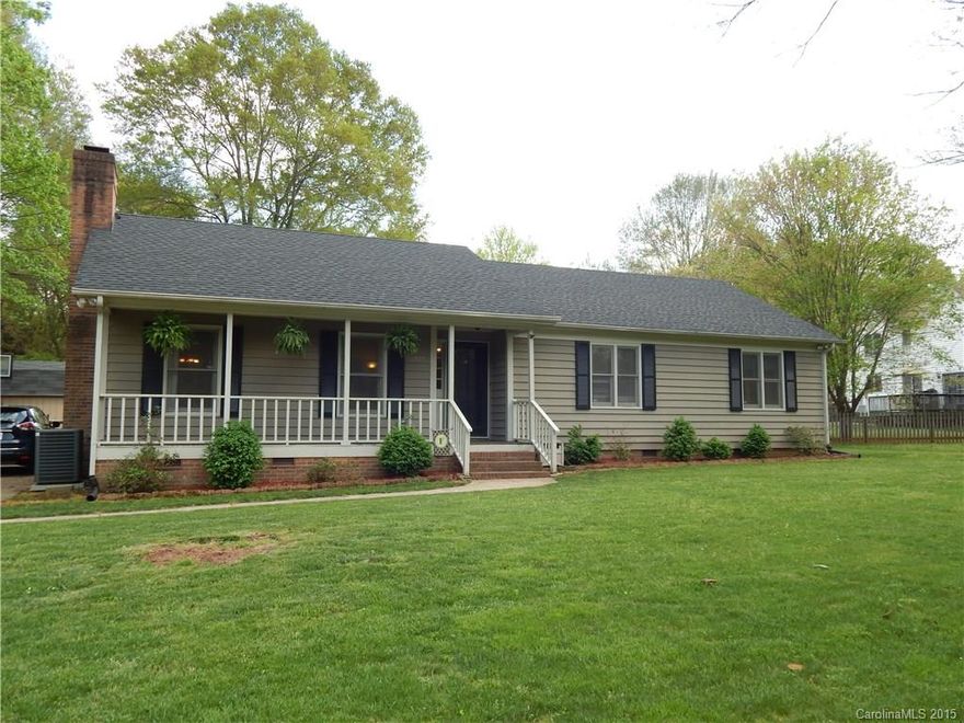 Desirable neighborhood convenient to Matthews, the Arboretum, Southpark, and more!  Imagine yourself in this cute ranch with rocking-chair front porch!  Enjoy the deck overlooking the spacious fenced-in back yard or relax by the gas-log fireplace.  Walk along tree-lined streets in this beautiful and established neighborhood.  Home has many features: new roof in 2014, laminate flooring, walk-in and deep closets, whole-house water filter, whole-house pressure reducer valve, storage shed, and more!