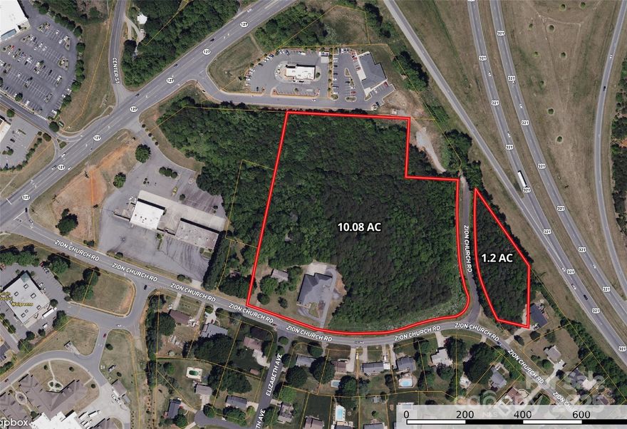 11.28 Acres of land for sale off Zion Church Road with visibility from Hwy. 321.   This land is ideal for redevelopment into commercial or multi-family residential housing with new commercial and residential development being developed near by in the Mountain View area of Catawba County.   With quick access to Hickory NC and a fast 30 minute drive to Charlotte this is a great opportunity for a developer.  The land currently has a owner occupied duplex and two abandoned homes on the property.  The land is currently zoned CC-1 and has water,sewer, and gas available near by.  The zoning district is Hickory NC.  The property consist of 2 parcels 370113049669 and 370113146566.  This property is also being marketed with an addtional 8.47 Acres that are next door.  Call listing agent for more details.