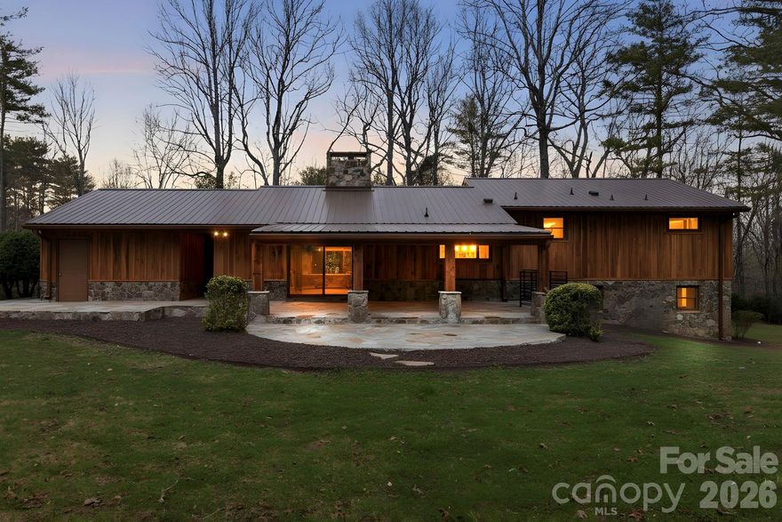 Welcome to this private, fully remodeled (2025-2026) exceptional 2.2 acre end-of-private street estate.  No city taxes and no HOA fees-just peace, privacy and effortless access to downtown shopping, events, restaurants, top schools, and the local racket club. 
Thoughtful custom-high end details include gorgeous hardwood flooring and abundant natural lighting for comfortable everyday living and easy entertaining.  The newly remodeled chef's kitchen includes a custom coffee bar, easy access pantry cupboard with an additional walk-in pantry for extra kitchen storage and utility.  Includes, Fully remodeled bathrooms and laundry room with additional storage.  New recessed lighting and fixtures throughout as well as a brand new HVAC system which insures efficient and dependable climate control.  
The exquisite exterior includes a Beautiful new Metal roof with a Custom Stone Chimney and copper trim.  This home is artfully designed with Stone and Hand Milled wood work, flagstone patios, walkways and Security Lighting that surround the entire property.  The Rich Cedar covered back patio has recessed lighting, stone and wood columns and black iron railing which is an ideal space that flows from the kitchen for morning coffee, alfresco dining and wildlife viewing of the expansive grounds.
The lower living area boasts a new imported Italian tile floor and unique Wormy Chestnut accents that give the home a refined, timeless charm.  The unique heated and cooled workspace provides year-round utility for hobbies, projects or secure equipment storage.  Practical conveniences include a two-car custom wood and stone carport with attached storage building and carefully designed covered walkways and porches that extend daily living outdoors while protecting you from the elements.
With no City taxes to complicate ownership, this property is a straightforward, low-hassle opportunity for buyers seeking privacy, character and modern upgrades on a beautifully maintained parcel.  Schedule a showing to experience the blend of thoughtful custom finishes and expansive outdoor living on this private 2.2 acre retreat.  Whether you're looking for a forever home with room to roam, a hobbyist's workshop and storage solution, or an elegant entertaining setting with near town amenities, this property delivers.