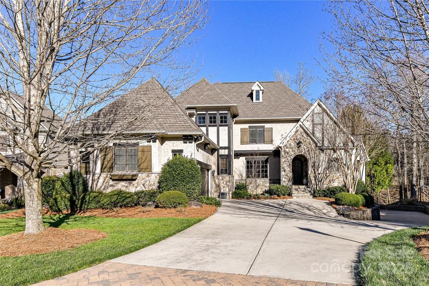 Old World Charm Meets Modern Luxury!  This European-style home in The Forest features a striking stucco, stone & wood exterior. Inside, the Great Rm boasts a vaulted, beamed ceiling, stone fplace, & built-ins. The open Kitchen is a chef’s dream w/a 6-burner gas cooktop, copper-adorned hood, dual ovens, large center island, granite, bksplash & under-cabinet lights. Primary Ste features an impressive tray ceiling w/shiplap & custom windows. The luxurious primary Bath offers a jetted tub, glass-enclosed shower & classic finishes. Laundry Rm/walk-in pantry/ drop-zone/workstation on main. All BR's w/ensuite Baths. The Basement features a Family Rm, wet bar, gas fp, BR & Full Bath +  exercise room. Outdoor living is just as fabulous w/a charming balcony porch, a covered porch & patio w/fire pit - all perfect for relaxing & entertaining. Two car garage on main + oversized 1-car garage on basement level. Fenced yard, irrigation. Super storage! Downtown Matthews 5 minutes away; great schools!