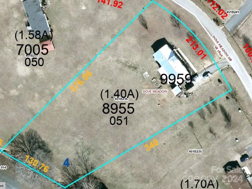 1.4 acres cleared and improved with well, septic, electric and driveway on a nice cul-de-sac street. Fire damaged mobile home will need to be removed. Established neighborhood with modular and doublewide homes is ready for yours. Zoning: GR6-, TR Class R-RESIDENTIAL, Land Use/Strat: 02-IMPROVED RESIDENTIAL. No survey.