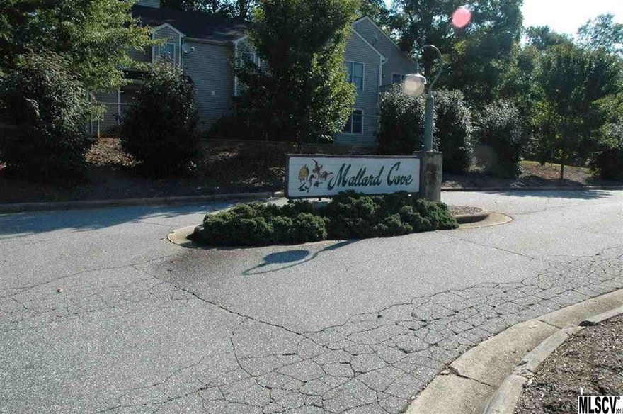 Spacious 2 bed/2 bath condo overlooking Lake Hickory. Enjoy serene natural settings and convenience of town. Walking distance to Glenn Hilton Park. Living room features vaulted ceiling with skylights for a more open feel. Extra space off of kitchen offers versatility, could be used as additional dining area or home office space. Laundry located in master suite. Enclosed porch off master and living room offers waterviews. Home features it's own attached garage. HOA fees include pool service, tennis court, trash service, grounds services, water and sewer service.