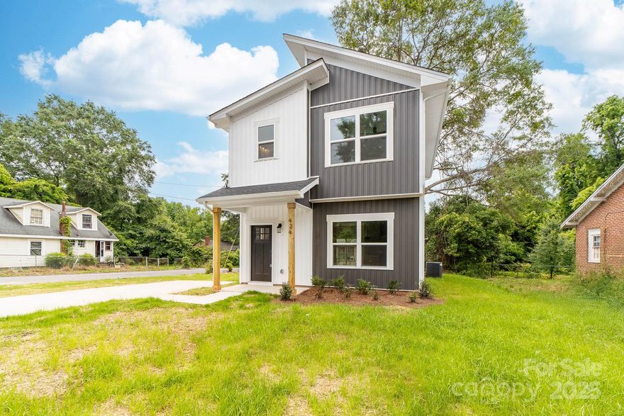 Welcome home to this stunning modern home with a privacy fence and backed by a 10-year Quality Builder Warranty!  This home has a spacious open floor plan on the mail level with enhanced 9 foot ceilings that create an even more open feel.  You will not want to miss the primary suite with 15 ft vaulted ceilings and a private bathroom, complete with dual sinks, beautiful tiled shower and upscale finishes.  In the kitchen you will find quartz countertops, soft close cabinetry, and a beautiful herringbone tile back splash.  These homes were designed with modern style but with everyday functionality in mind.   With the spacious main level open floor plan and the patio this home is perfect for daily living and entertaining.   Please note that the tax value is for the lot only.