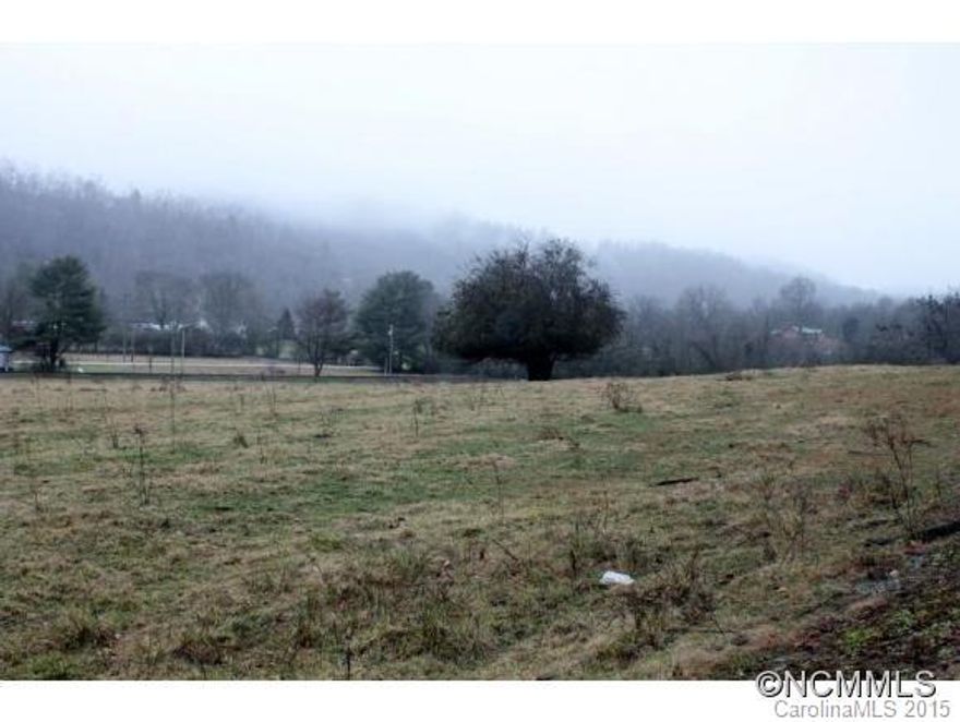 ATTENTION INVESTORS! This 21 acre UNRESTRICTED tract is flat pasture, creek, old barn. Situated between 2 state paved roads, this property offers city water, making it ideal for development! It is located 3.4 miles and less than 5 min. from the new Casino in Murphy! This is perfect for housing opportunities! There are 6 mobile home sites (3 shared septics) Great opportunity for a long term investment! The possibilities are enormous!