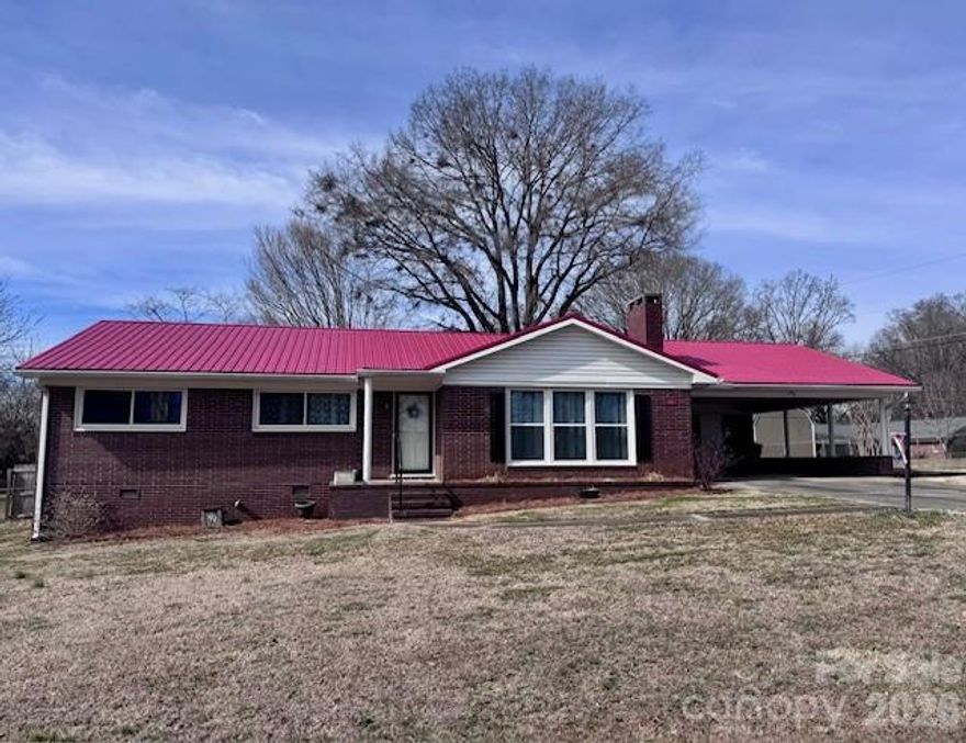 Welcome home to this charming all-brick ranch featuring 3 bedrooms and 2 full bathrooms, nestled in an established subdivision with no city taxes! Situated on a level lot, the property offers a fenced backyard with mature trees, a covered back patio, and a spacious yard - perfect for entertaining, family gatherings and pets.
Lovingly cared for and well maintained, this home boasts a brand new HVAC system and  the roof and all windows have been replaced within the last 8 years. The expansive living room features a cozy fireplace, hardwood floors and abundant natural light. The generously sized kitchen includes an open dining area, ideal for everyday living and hosting. Additional highlights include a 2-car carport with utility closet and an outbuilding/shed providing plenty of extra storage. This move-in-ready home offers comfort, functionality and timeless appeal. Conveniently located close to I77 and downtown Statesville!